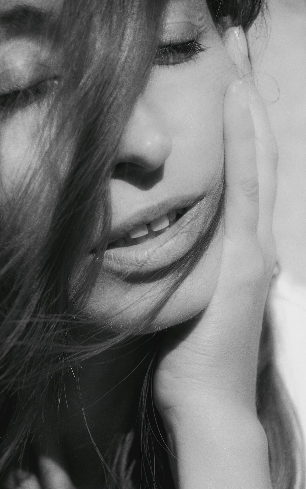 Portrait of a young woman with a gentle smile